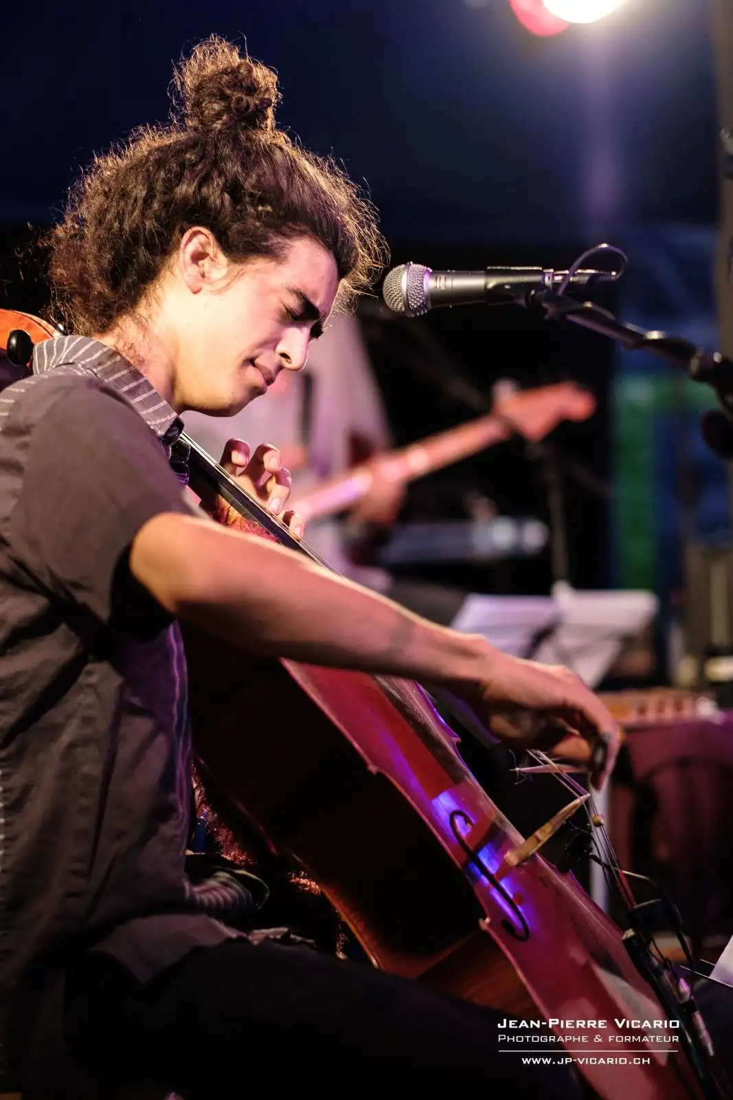 Gabriel on stage with lights